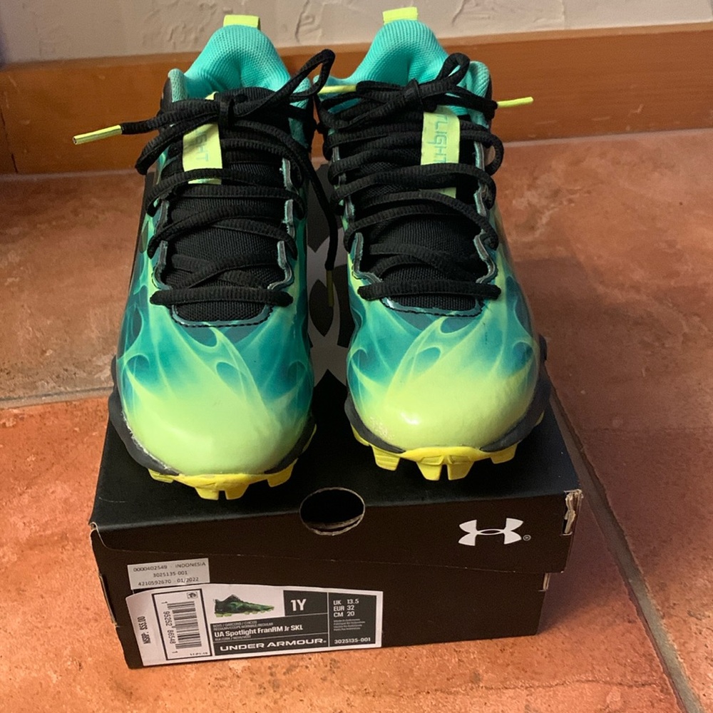Under Armour, cleated shoes, size one youth, black green colors, like nail